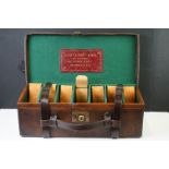 ' The Army & Navy C.S.L ' large leather 7-section shotgun cartridge case with fitted interior,