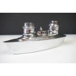 An Art Deco cruet set in the form of a cruise ship.