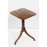 George III Mahogany Rectangular Tilt Top Table raised on a turned column support and three splayed