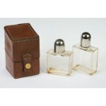 Vintage leather cased travelling scent bottles