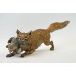 A well cast Austrian cold painted bronze of a fox at hunt, indistinctly signed to underside.