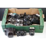 A collection of SLR film cameras with lenses, flashes...etc. to include Minolta, Olympus, Zenit