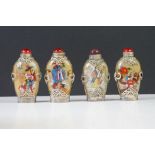 A collection of four reverse painted Chinese scent bottles.