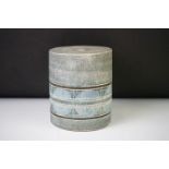 Troika pottery cyclindrical lamp base, decorated with a band of geometric design, signed 'Troika