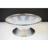 Opaque glass pedestal bowl, with a hammered finish metal foot and metal edge mount, diameter 30.5cm,