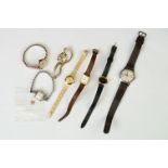 A small collection of mixed wristwatches to include a ladies 9ct gold cased example.