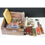 A group of mixed collectables to include souvenir spoons and enamel badges.