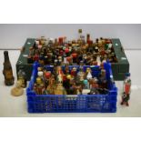 Collection of over 130 alcoholic miniatures to include a Guinness 3-pack, Foster's Military Gin,