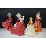 Four Royal Doulton figures, comprising: 'Autumn Breeze', HN1934, 'Julia', HN 2705, 'Lilac Time',