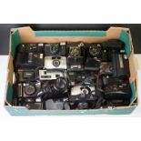 A large collection of 35mm compact cameras to include Canon, Olympus and Pentax examples.