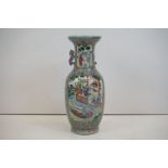 Chinese vase painted with figural panels, amongst a geometric and floral background, 61cm high