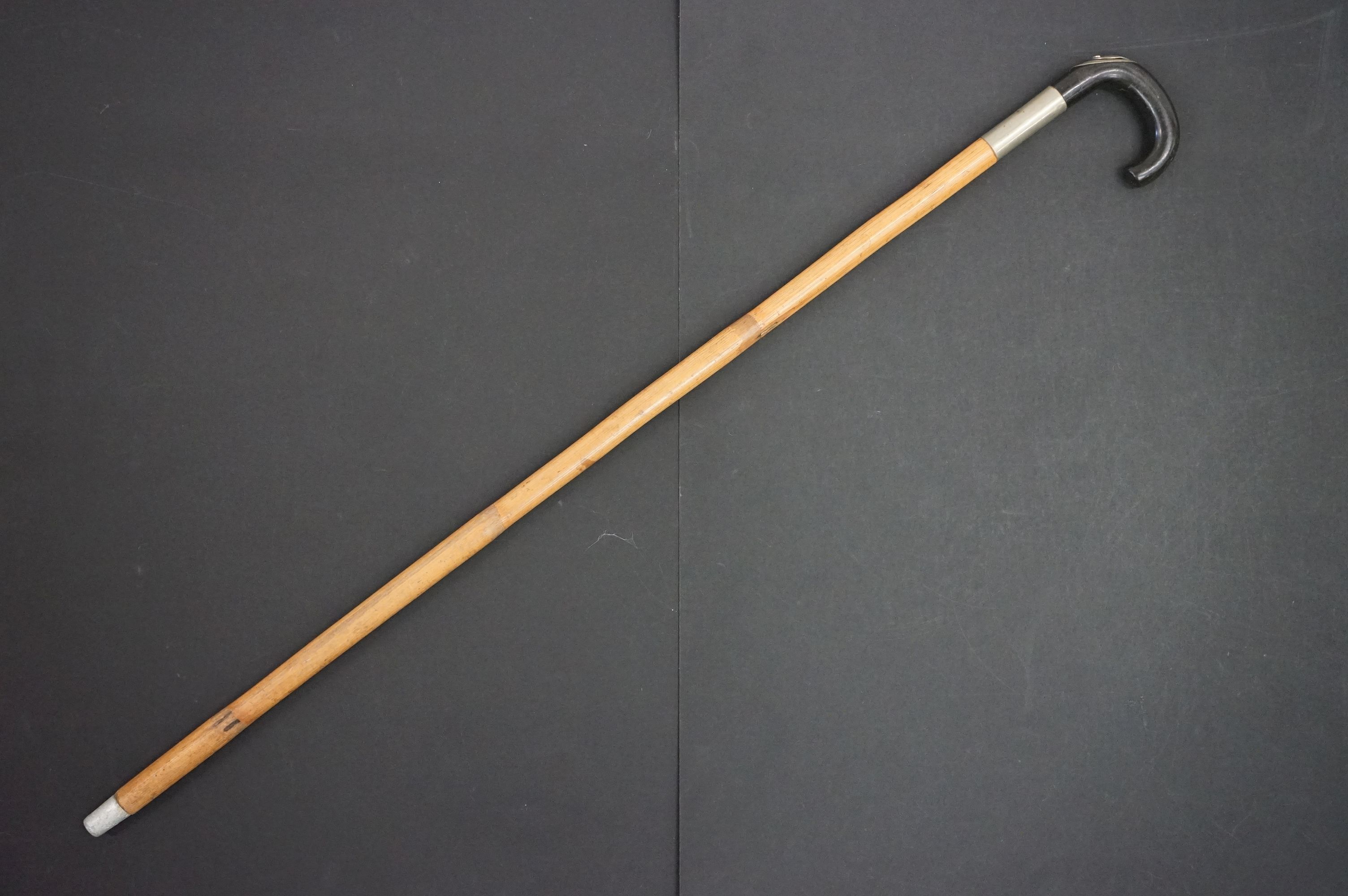 Early-to-mid 20th century bamboo horse measuring walking stick, the curved handle with removable