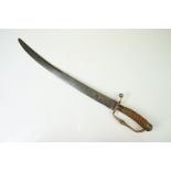 A antique short sword with antler handle and brass fitting.