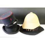 Christys' of London black wool top hat, together with a Vietnamese tropical pith helmet, a French