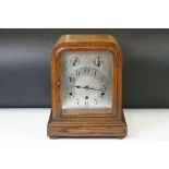 Early 20th century oak Westminster chiming mantle clock, with silver dial, Arabic numerals, slow/