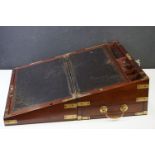 19th Century campaign style brass bound mahogany writing slope, opening to a black leather slope and