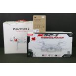 Two boxed drones to include dji Phantom 2 The Sprit Of Flight appearing complete with spare battery,