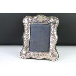 A sterling silver photograph frame with decorative Celtic design
