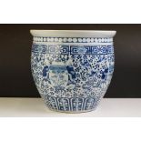 Large Chinese blue & white jardiniere, decorated with figures and birds perched on blossoming