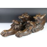 Pair of antique carved oak wall brackets in the form of dragons, measure approx 43cm high