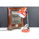 An early 20th century electric fire together with a red retro desklamp