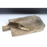 Antique wooden chopping block, 55.5cm long together with axe, 29cm long