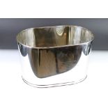 A large silver plated champagne ice bucket bearing an inscription.