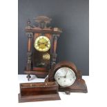 A wooden wall clock together with a mantle clock and a wooden desk tidy.