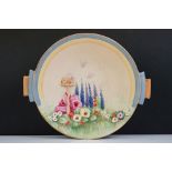 Art Deco Royal Winton Dish with moulded decoration of a Birds and a Bird Table in a Garden, 23cm