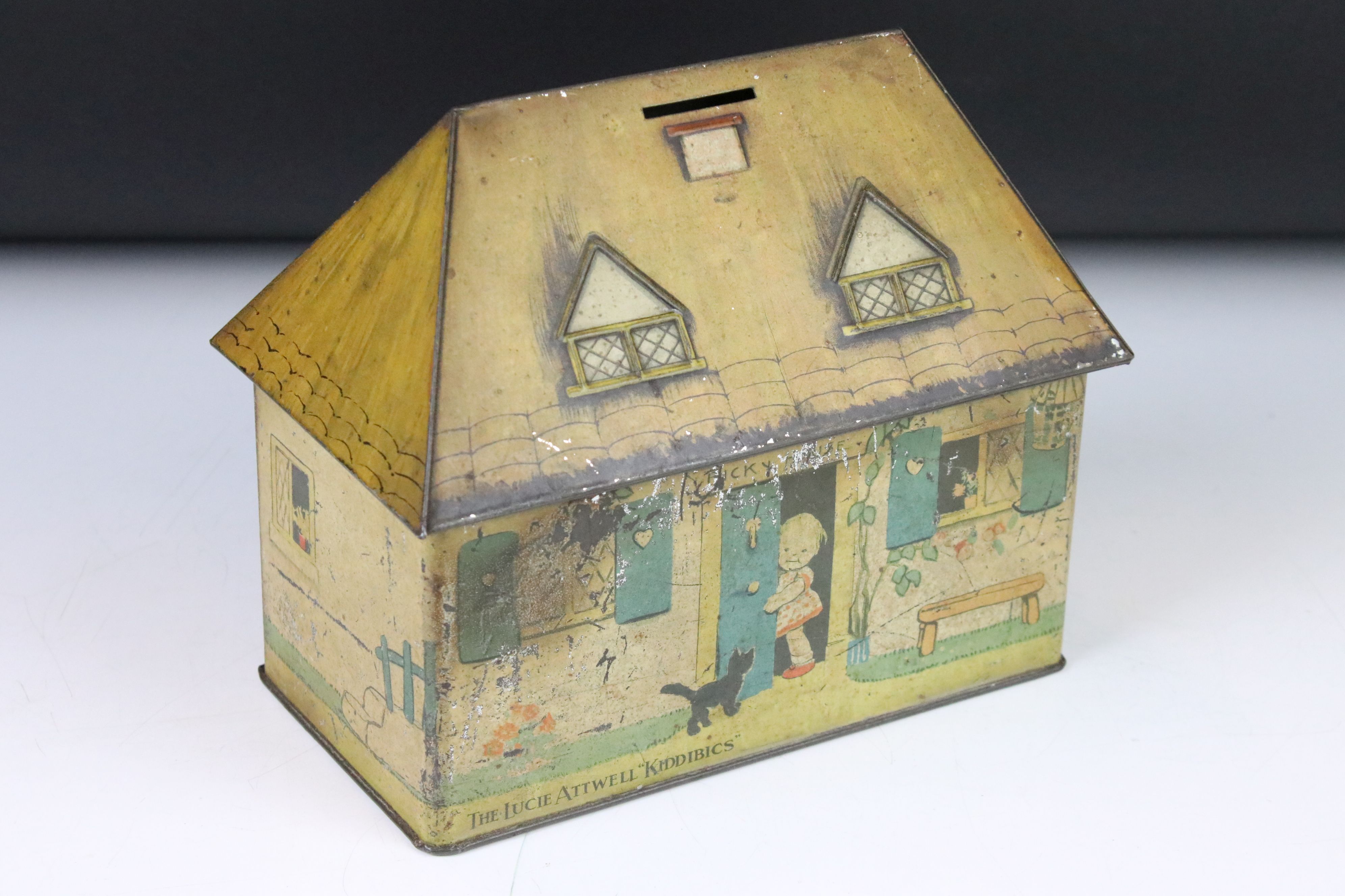 William Crawford & Sons "The Lucie Attwell Kiddibics" biscuit tin moneybox, approx 20.5cm wide