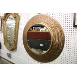 Large Gilt Metal Circular Wall Mirror with deep textured frame, 81cm diameter