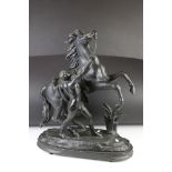 After Guillaume Coustou - A pair of spelter Marley horses raised on wooden bases, approx 60cm high