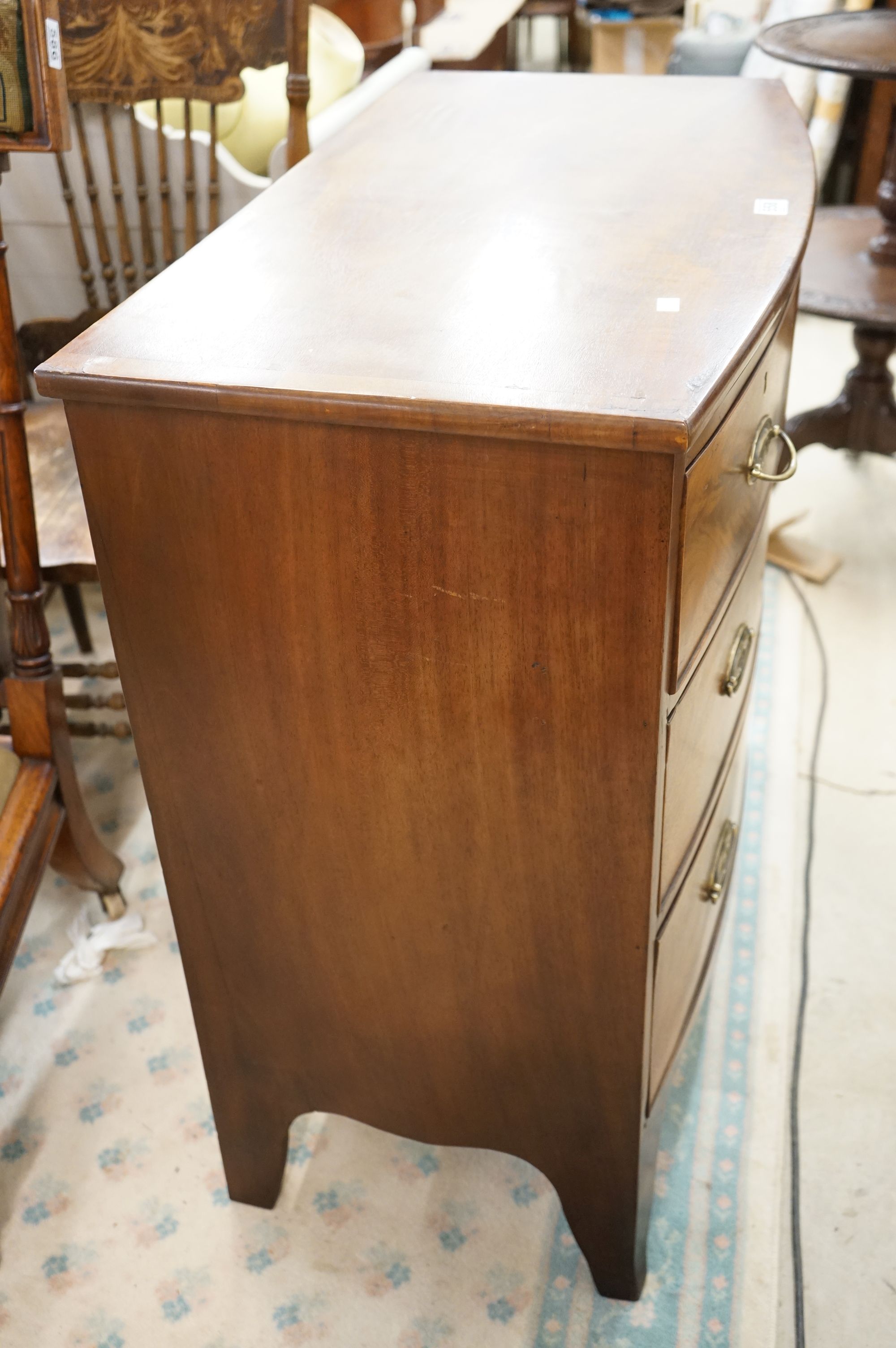 A 19th century mahogany bow front chest of 2 short and 2 long drawers of small proportions. - Image 9 of 10