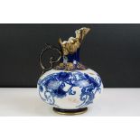 Early 20th Century James Macintyre blue & white gilded jug, of squat baluster form, with floral