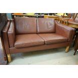 Danish Brown Tan Leather Two Seater Sofa in the style of Borge Mogensen, raised on square beech legs