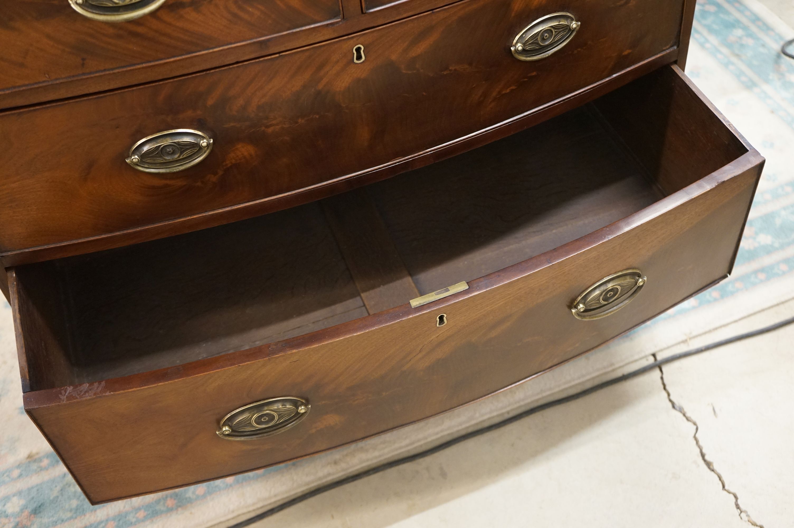 A 19th century mahogany bow front chest of 2 short and 2 long drawers of small proportions. - Image 6 of 10