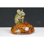 Royal Doulton George Tinworth stoneware figure, modelled as a green glazed mouse grasping a currant,