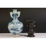Chinese blue & white twin-handled ceramic bottle vase decorated with warriors on horseback, with