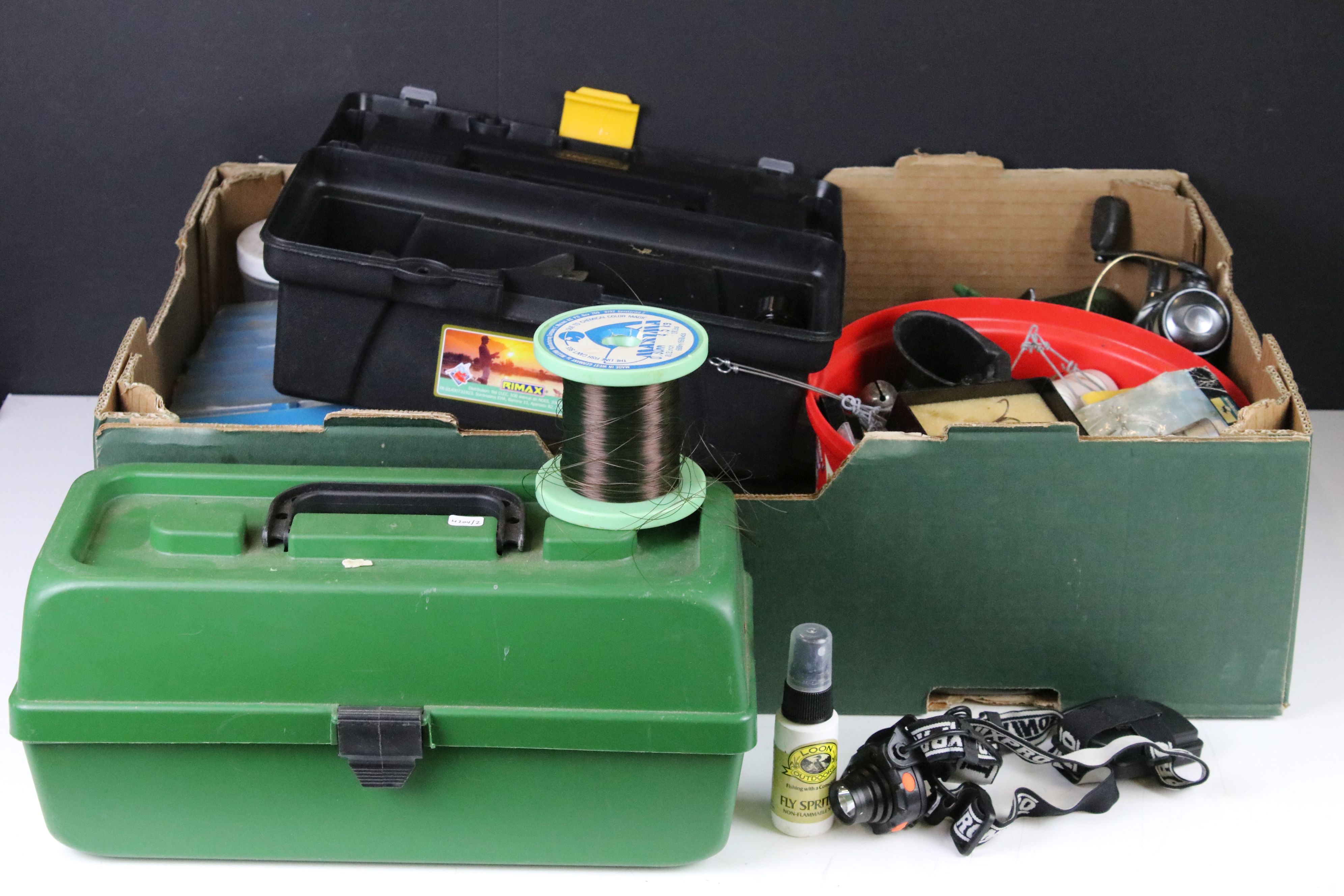 Large quantity of fishing items to include reels, weights, floats, waterproofs and many other