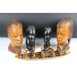 Pair of Nigerian carved hardwood busts (20cm high), together with a further pair of carved African