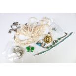 A small collection of mixed costume jewellery to include Rings, necklace, bracelet, brooch....etc.