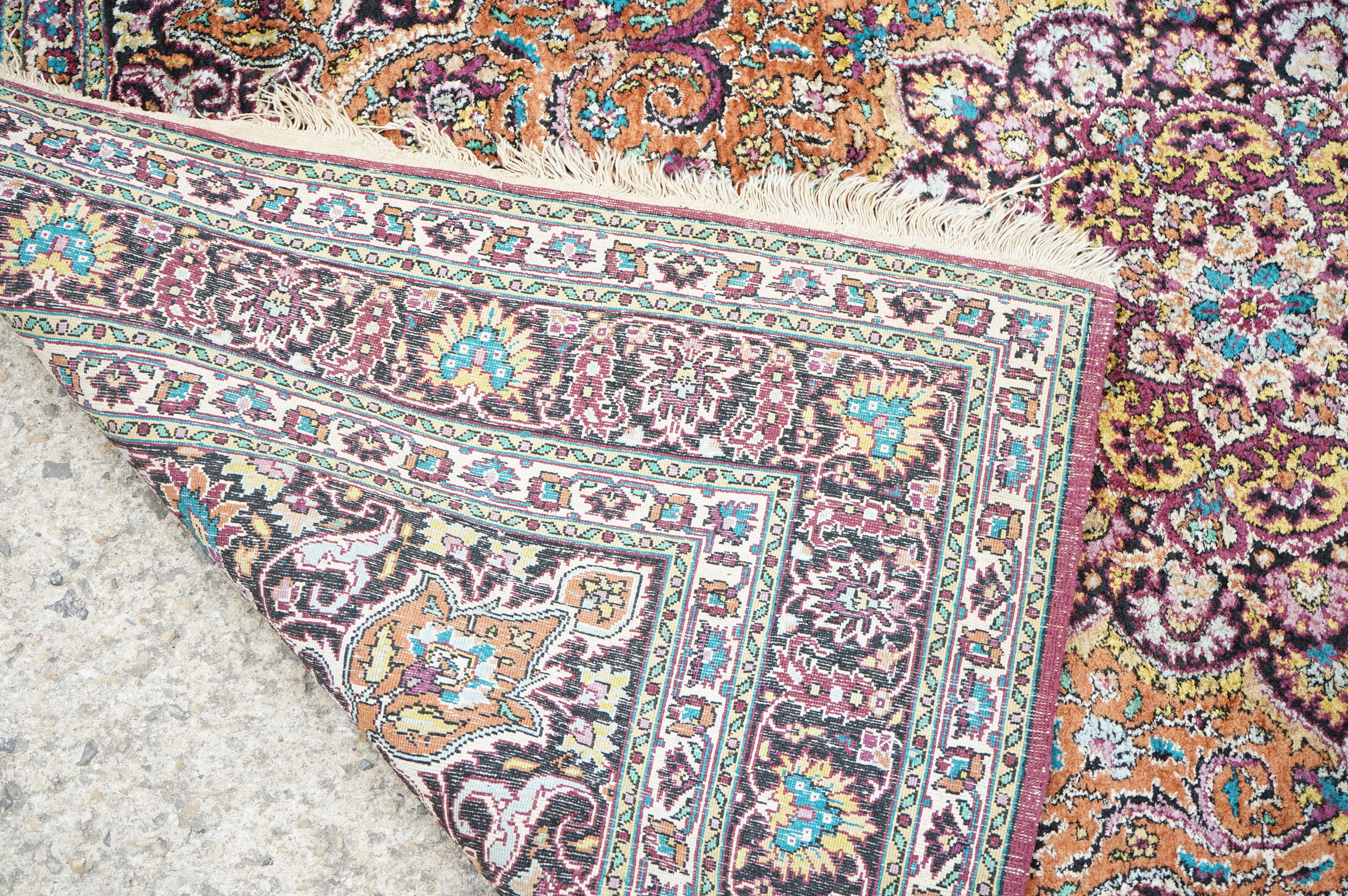 Indian Silk Kashmir Rug decorated with a central cartouche and a dense floral pattern within a - Image 8 of 8