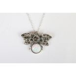 A silver bug pendant necklace with opal panel and marcasite's.