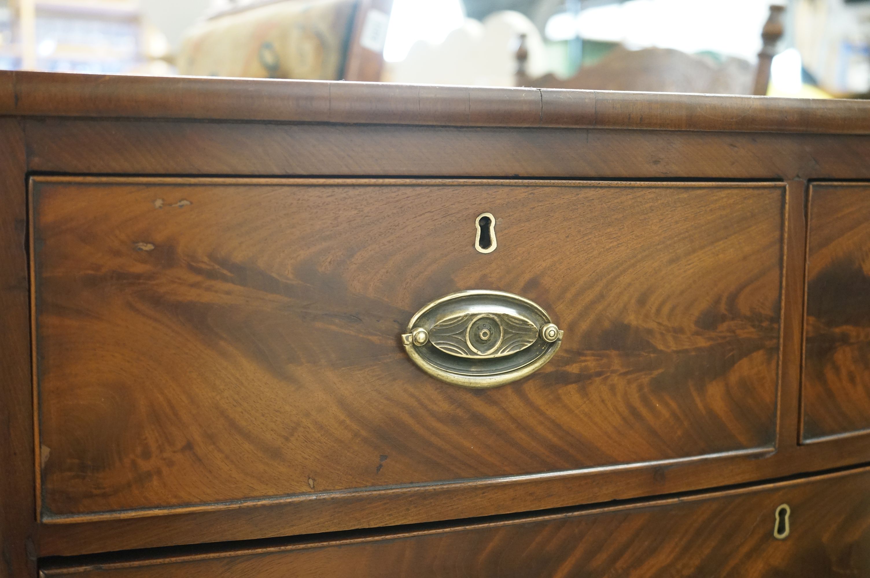 A 19th century mahogany bow front chest of 2 short and 2 long drawers of small proportions. - Image 3 of 10