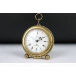 A vintage Swiza 7 Jewel, 8 day travel alarm clock.