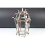 Early 20th century Arts & Crafts glazed copper lantern, of hexagonal form, raised on four