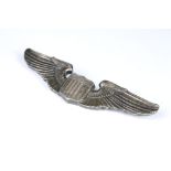 A WWII United States Air Force wings badge, stamped Sterling