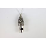 A silver dog figural whistle on chain.