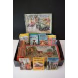 A large collection of Ladybird books together with two boxed wooden Victory jigsaw puzzles.