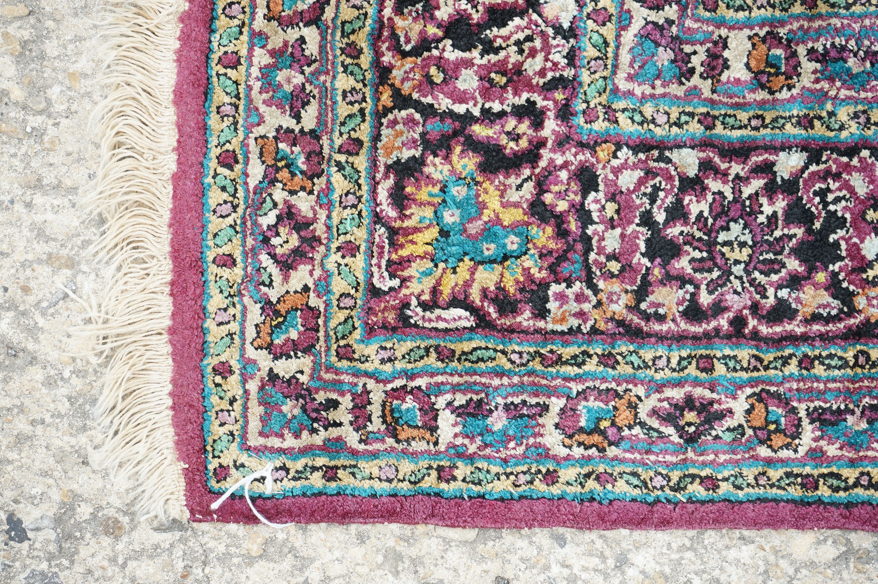 Indian Silk Kashmir Rug decorated with a central cartouche and a dense floral pattern within a - Image 7 of 8